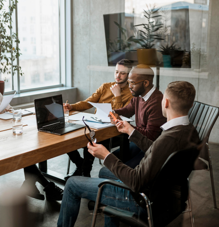 Technology professionals in modern meeting room